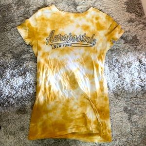 This is a yellow and white cute shirt